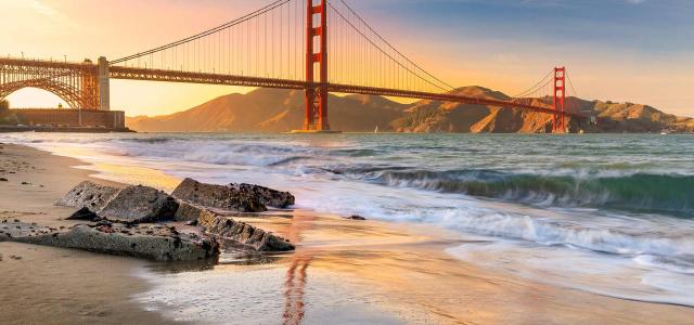 Sunset at the Beach by the Golden Gate Bridge in San Francisco California